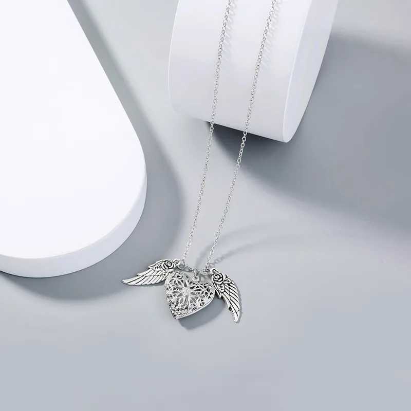 Elegant Angel Wings Luminous Heart Necklace