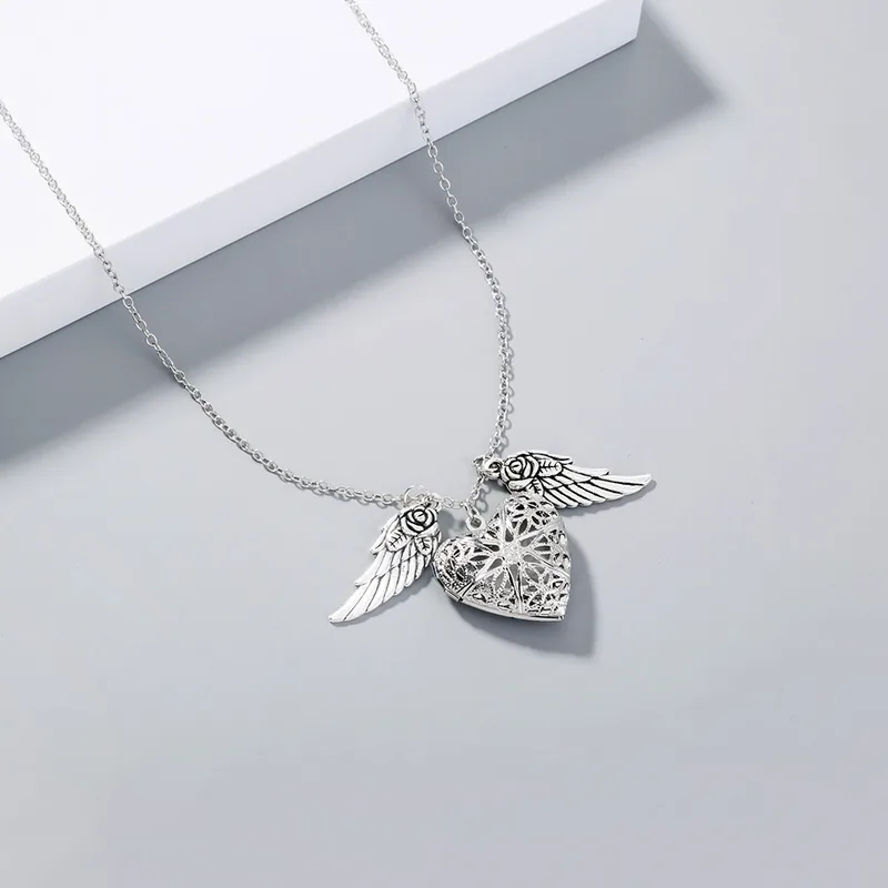 Elegant Angel Wings Luminous Heart Necklace